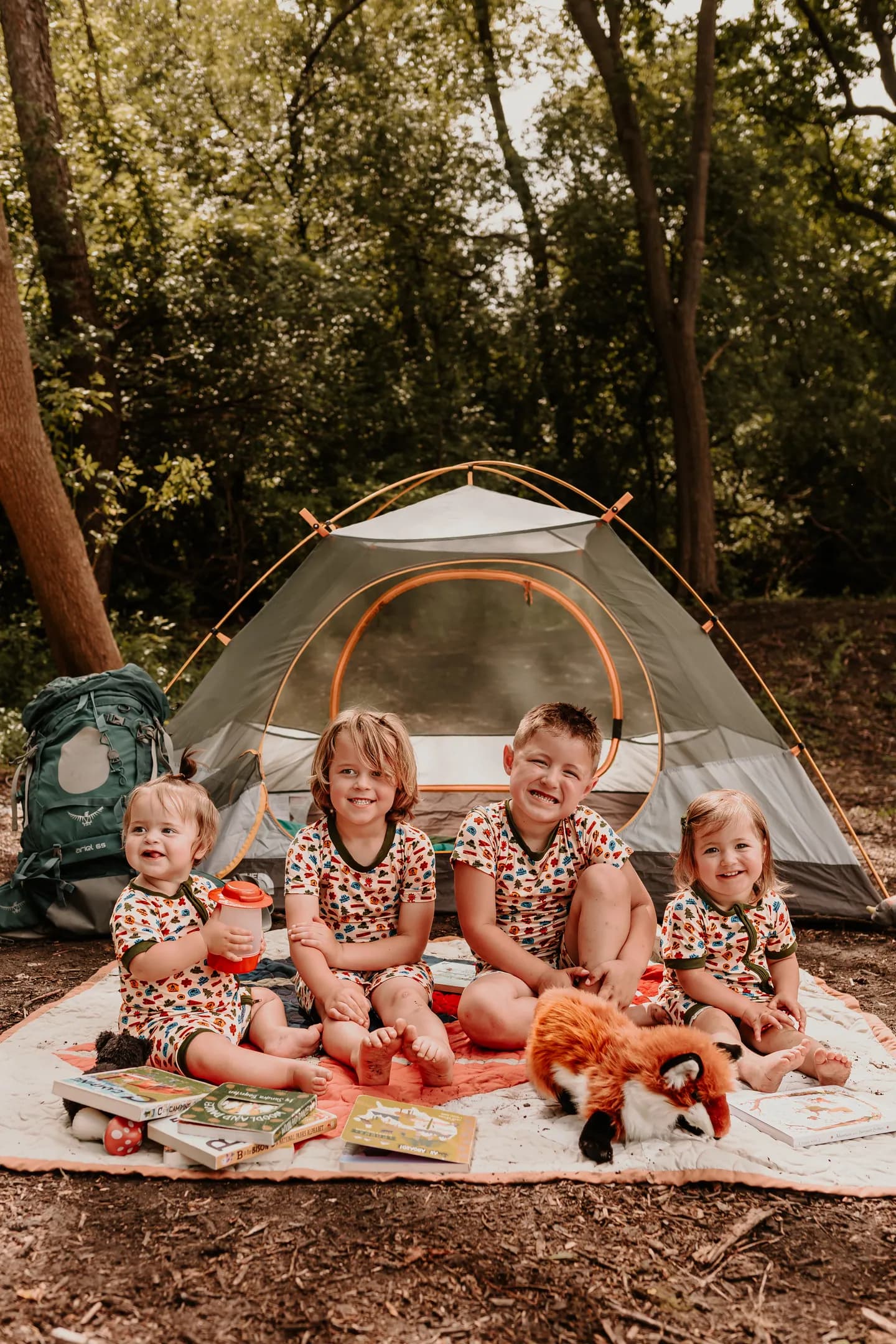 Kids wearing Summer Camp outfits at an outdoor picnic